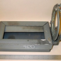 The FBI built this model of the collar and the box that contained the bomb; the box is empty of components. The collar is attached backwards here; Wells wore the bomb with the open section away from his chest, rather than against it. ERIE TIMES-NEWS/FBI